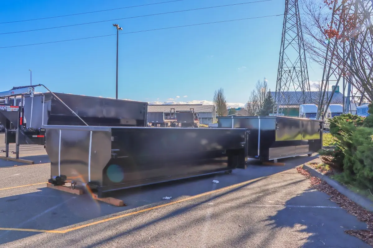 Roll-off dumpster ready for waste disposal at job site for Estate Cleanout Dumpster Rental in Country Club